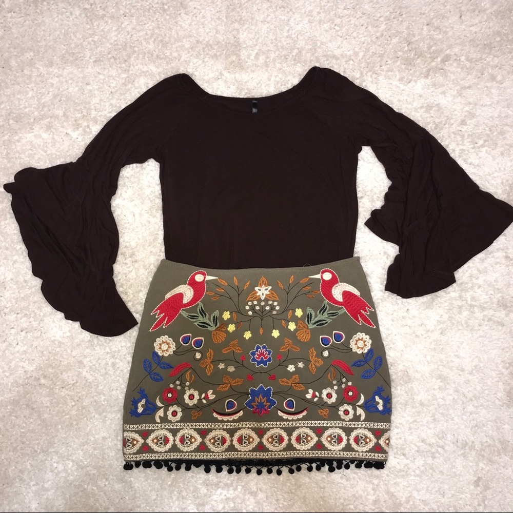 Green skirt with tassels